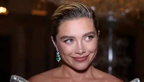 Florence Pugh Turns Heads Wearing Silver at “Spider-Man” Premiere